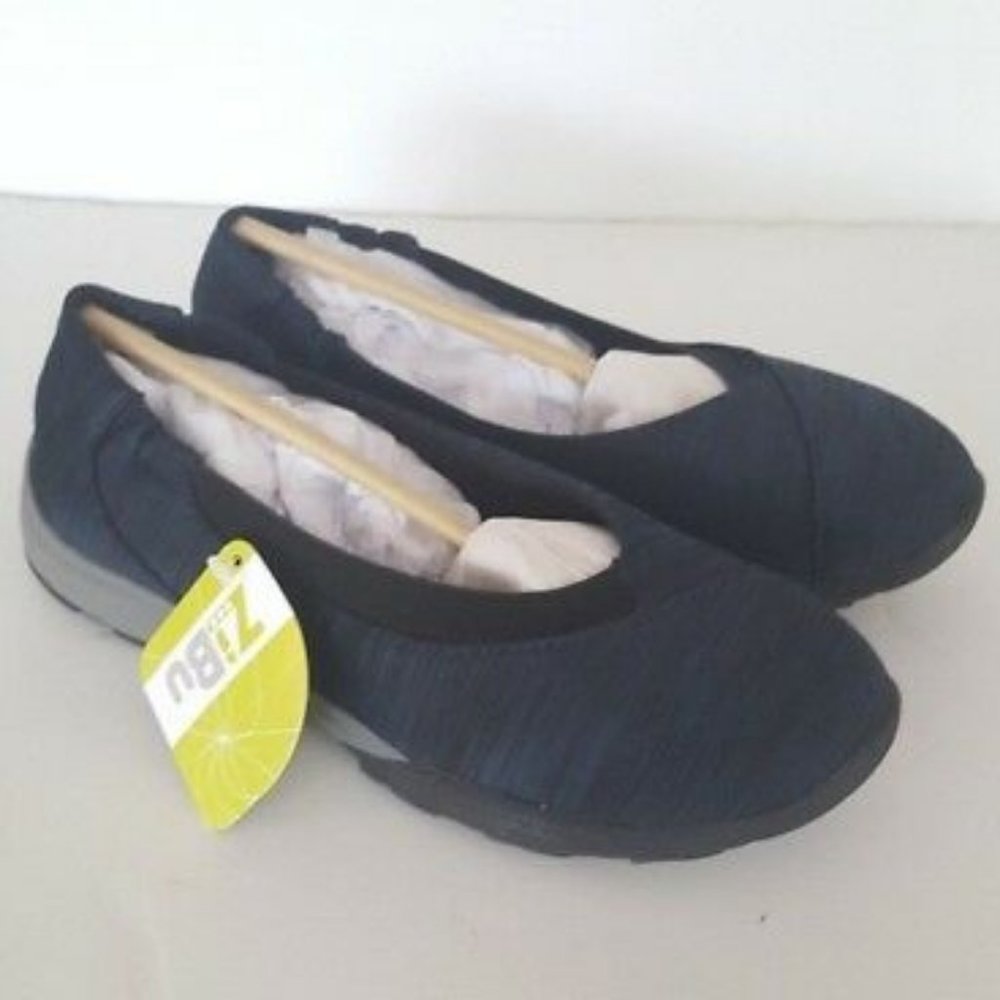 Zibu Hiley navy blue and black striped slip-on shoes.